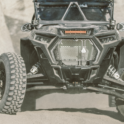 amber 10 inch led light bar mounted on a polaris rzr side by side