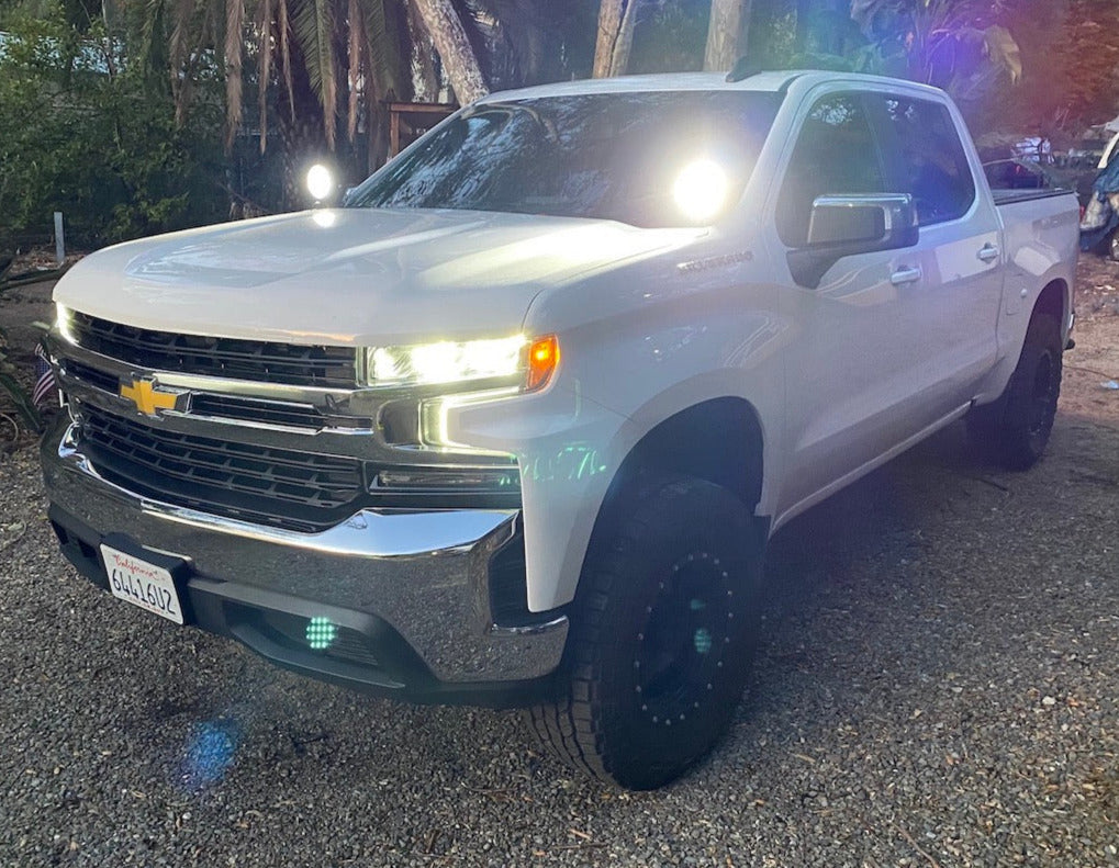 chevy silverado with 5" GG Lighting daymaker led lights off road mounted on the pillars 